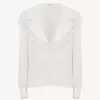 Blusa con collo alto in jacquard di seta e pizzo Blusa con collo alto in jacquard di seta e pizzo