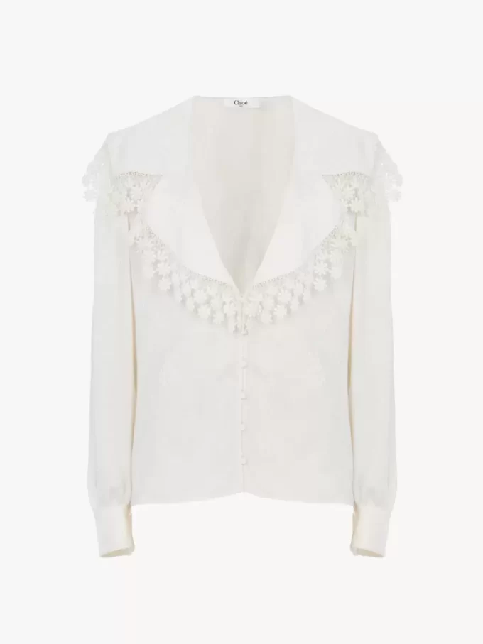 Blusa con collo alto in jacquard di seta e pizzo Blusa con collo alto in jacquard di seta e pizzo