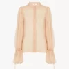 Blusa con maniche a sbuffo in mousseline di seta Blusa con maniche a sbuffo in mousseline di seta
