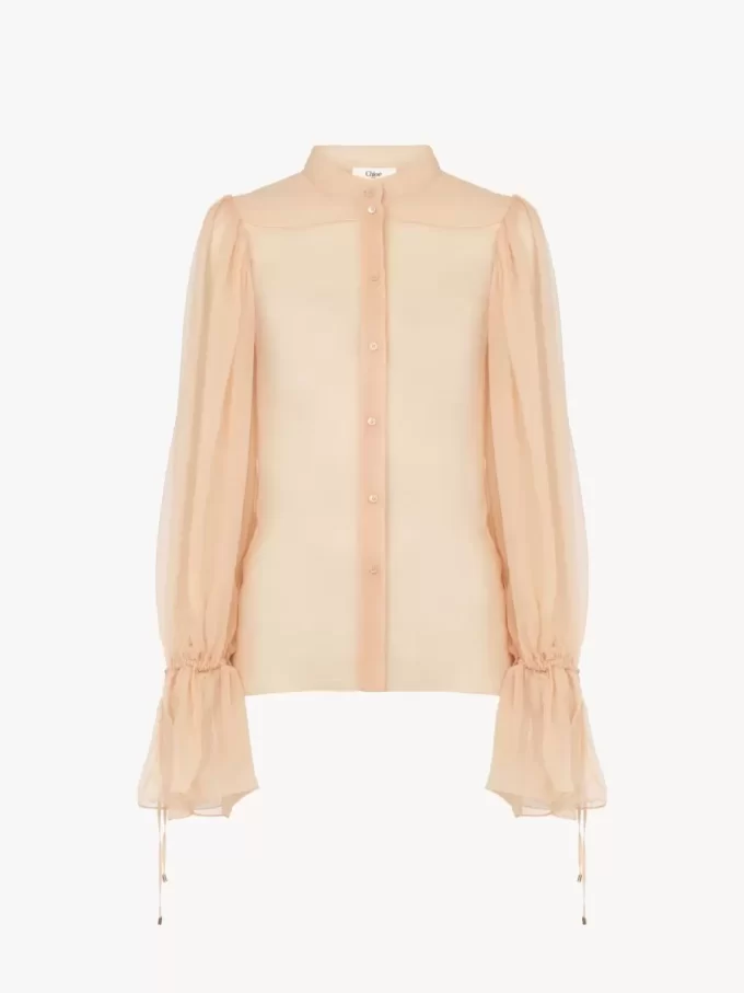 Blusa con maniche a sbuffo in mousseline di seta Blusa con maniche a sbuffo in mousseline di seta