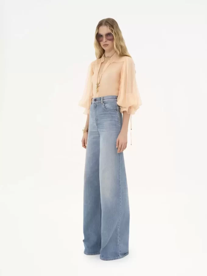 Blusa con maniche a sbuffo in mousseline di seta Blusa con maniche a sbuffo in mousseline di seta