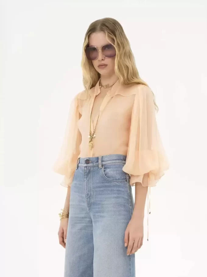Blusa con maniche a sbuffo in mousseline di seta Blusa con maniche a sbuffo in mousseline di seta