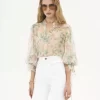 Blusa con maniche a sbuffo in mousseline di seta Blusa con maniche a sbuffo in mousseline di seta