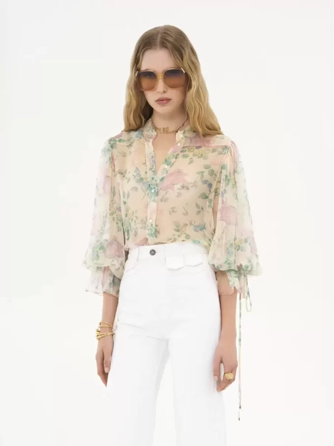 Blusa con maniche a sbuffo in mousseline di seta Blusa con maniche a sbuffo in mousseline di seta