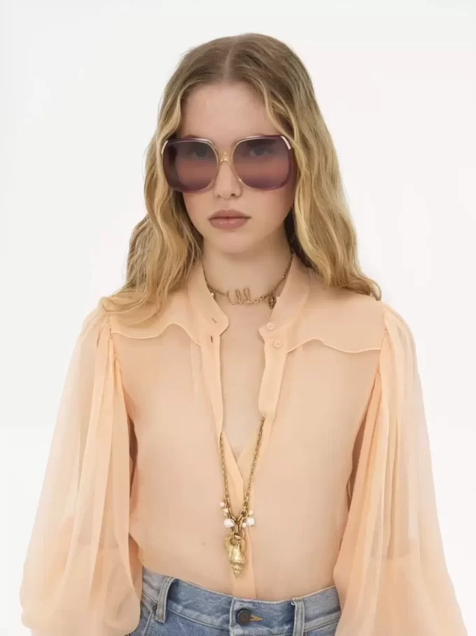 Blusa con maniche a sbuffo in mousseline di seta Blusa con maniche a sbuffo in mousseline di seta