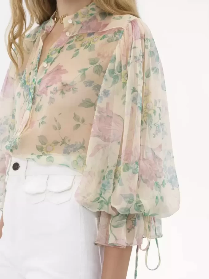 Blusa con maniche a sbuffo in mousseline di seta Blusa con maniche a sbuffo in mousseline di seta