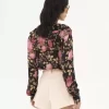 Blusa con scollo a V e volant in charmeuse di seta Blusa con scollo a V e volant in charmeuse di seta