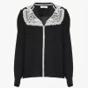 Blusa con volant in crêpe de chine e pizzo Blusa con volant in crêpe de chine e pizzo