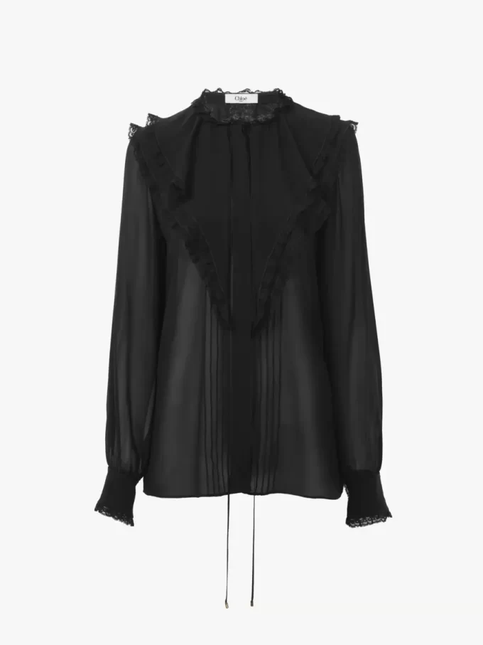 Blusa con volant in georgette di seta Blusa con volant in georgette di seta
