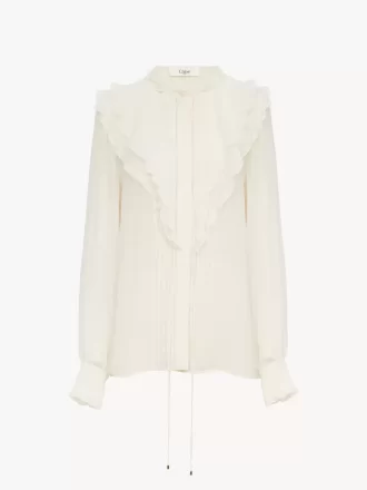 Blusa con volant in georgette di seta