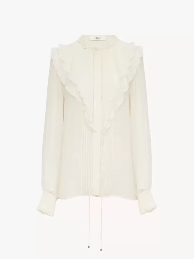 Blusa con volant in georgette di seta Blusa con volant in georgette di seta