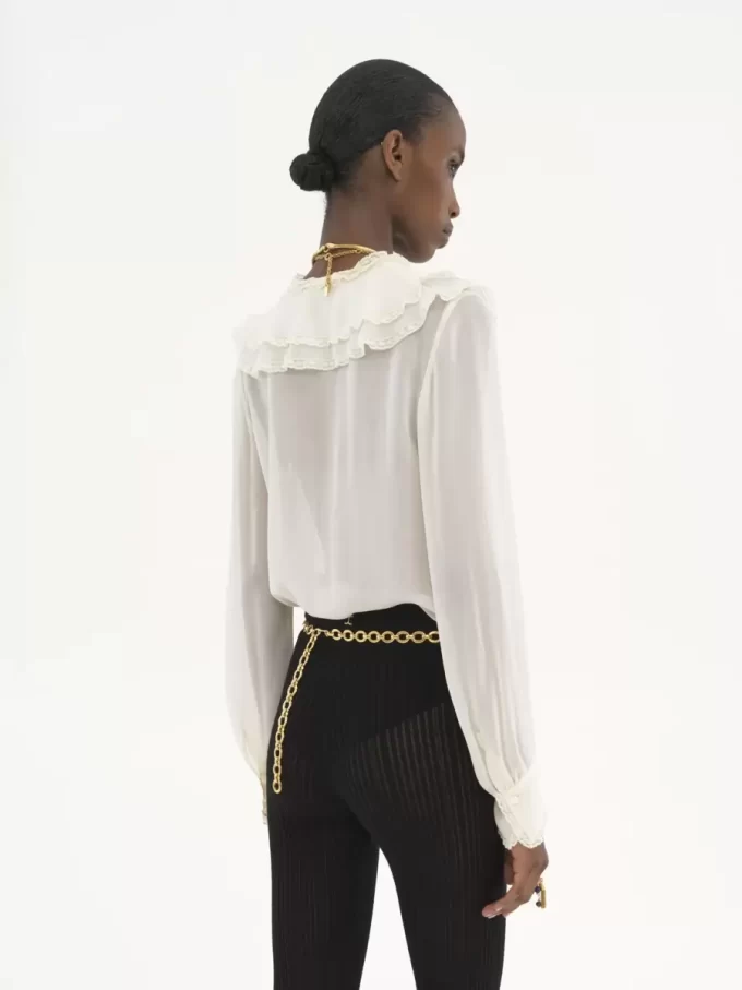 Blusa con volant in georgette di seta Blusa con volant in georgette di seta