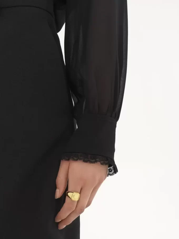 Blusa con volant in georgette di seta Blusa con volant in georgette di seta