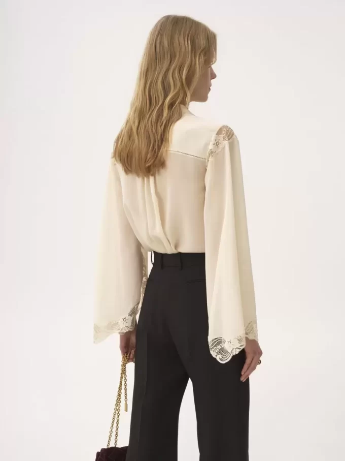 Blusa fluida in georgette di seta e pizzo Blusa fluida in georgette di seta e pizzo