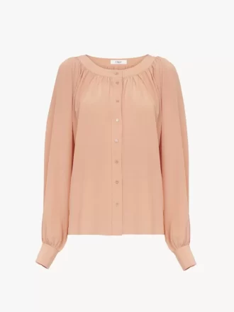 Blusa girocollo in crêpe de chine