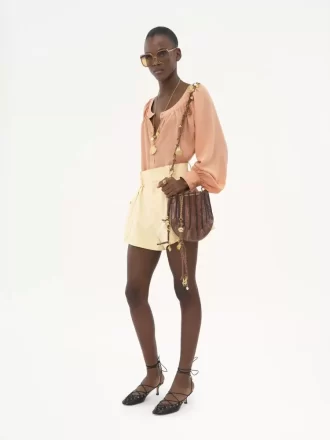 Blusa girocollo in crêpe de chine