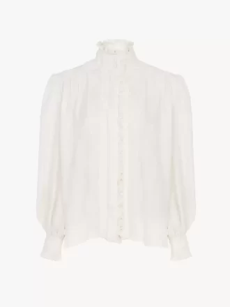 Blusa oversize con volant in jacquard di seta Blusa oversize con volant in jacquard di seta