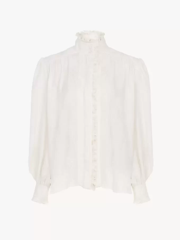 Blusa oversize con volant in jacquard di seta Blusa oversize con volant in jacquard di seta