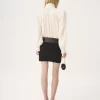 Blusa oversize con volant in jacquard di seta Blusa oversize con volant in jacquard di seta