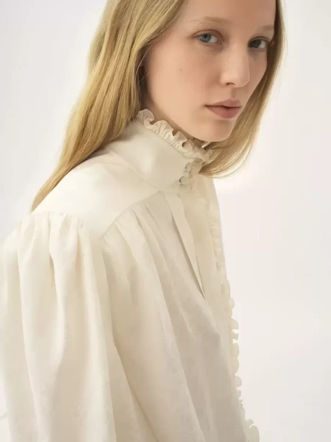 Blusa oversize con volant in jacquard di seta Blusa oversize con volant in jacquard di seta