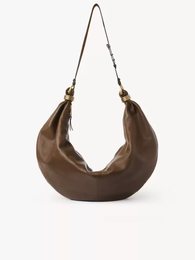 Borsa Hobo grande con bracciale in pelle martellata Borsa Hobo grande con bracciale in pelle martellata