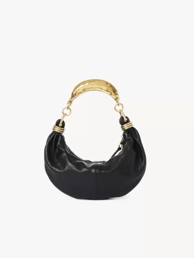 Borsa hobo piccola con bracciale in pelle martellata Borsa hobo piccola con bracciale in pelle martellata