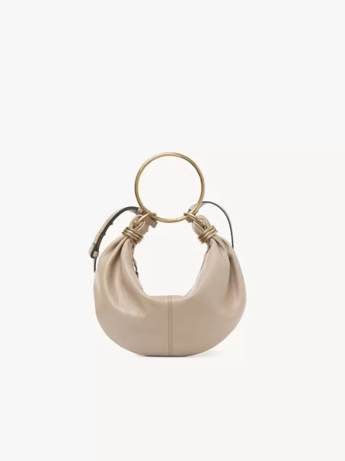 Borsa Hobo piccola con bracciale in pelle martellata Borsa Hobo piccola con bracciale in pelle martellata