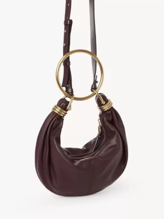 Borsa Hobo piccola con bracciale in pelle martellata Borsa Hobo piccola con bracciale in pelle martellata