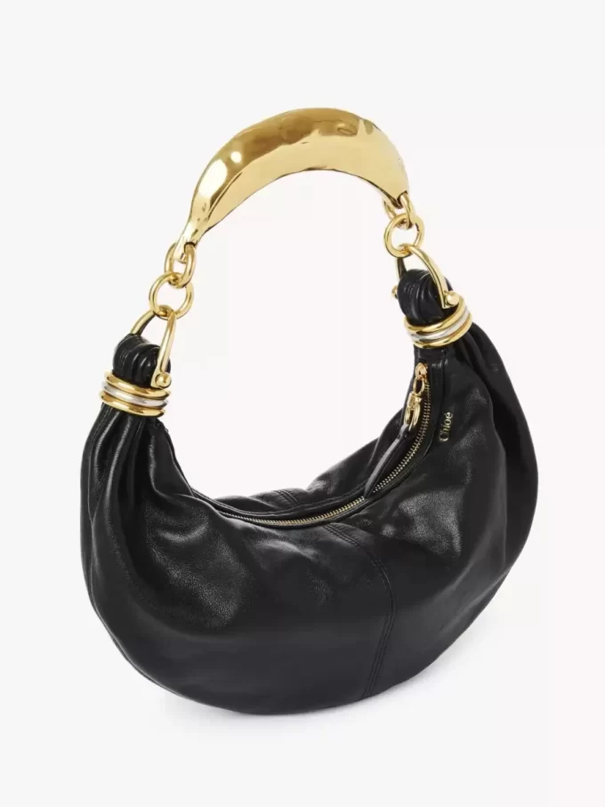 Borsa hobo piccola con bracciale in pelle martellata Borsa hobo piccola con bracciale in pelle martellata