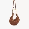 Borsa Hobo piccola con bracciale in pelle martellata Borsa Hobo piccola con bracciale in pelle martellata