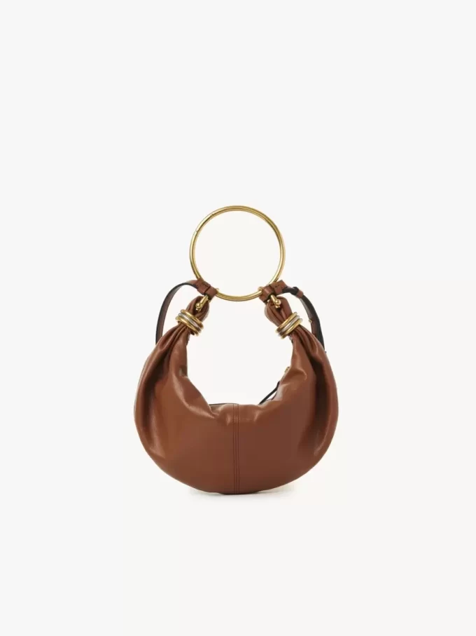 Borsa Hobo piccola con bracciale in pelle martellata Borsa Hobo piccola con bracciale in pelle martellata