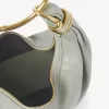Borsa Hobo piccola con bracciale in pelle martellata Borsa Hobo piccola con bracciale in pelle martellata