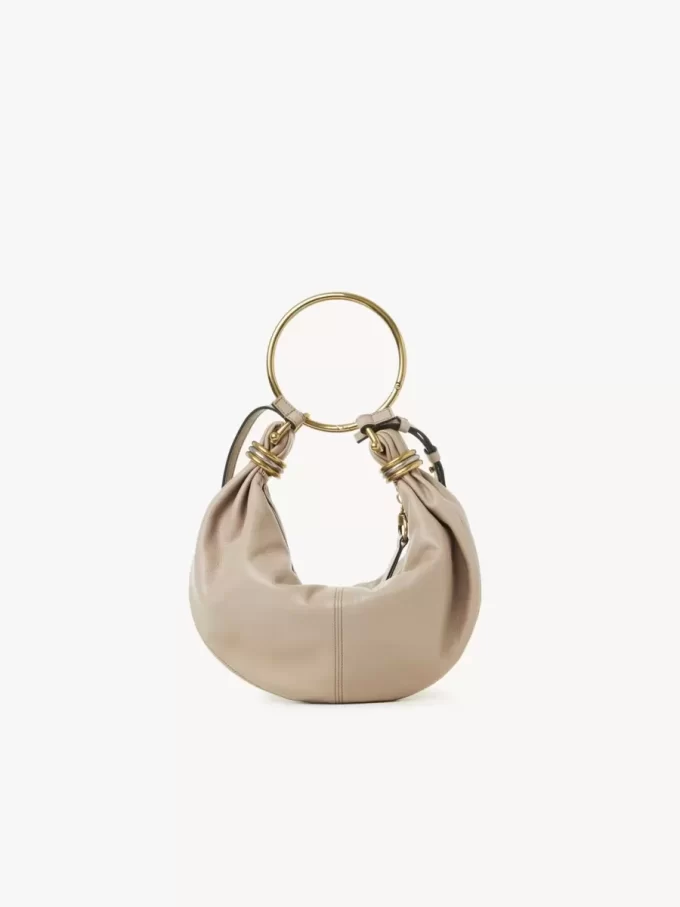 Borsa Hobo piccola con bracciale in pelle martellata Borsa Hobo piccola con bracciale in pelle martellata