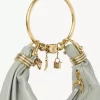 Borsa Hobo piccola con bracciale in pelle martellata Borsa Hobo piccola con bracciale in pelle martellata