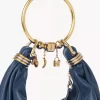 Borsa Hobo piccola con bracciale in pelle martellata Borsa Hobo piccola con bracciale in pelle martellata