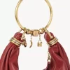 Borsa Hobo piccola con bracciale in pelle martellata Borsa Hobo piccola con bracciale in pelle martellata