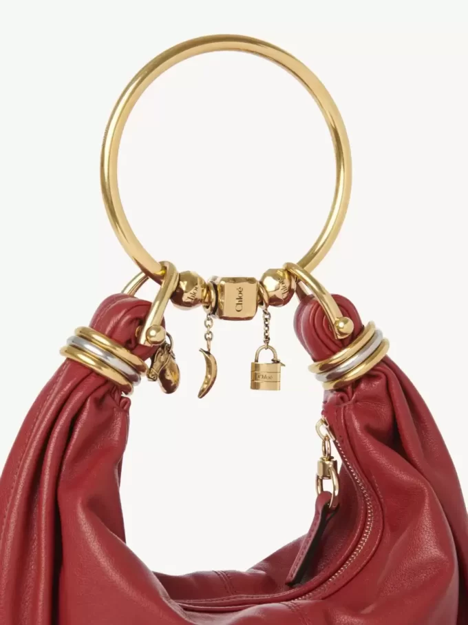 Borsa Hobo piccola con bracciale in pelle martellata Borsa Hobo piccola con bracciale in pelle martellata