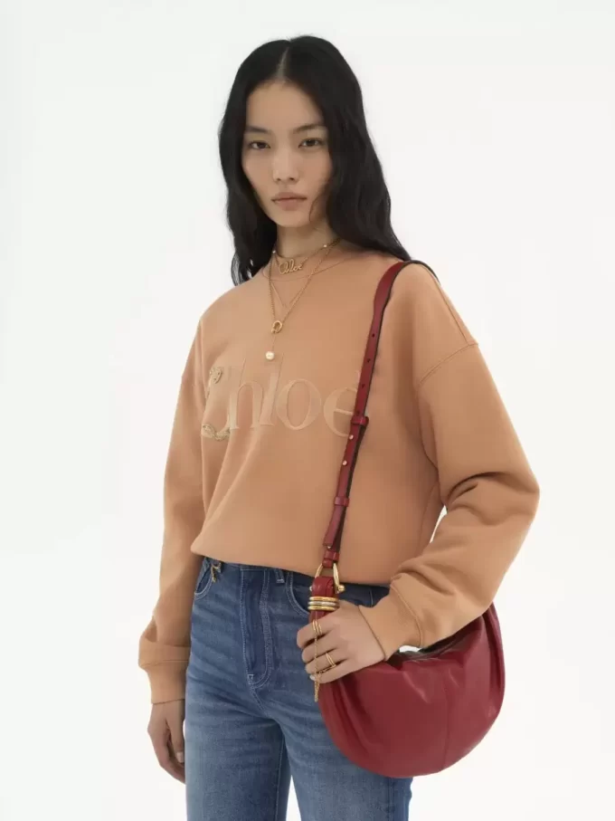 Borsa Hobo piccola con bracciale in pelle martellata Borsa Hobo piccola con bracciale in pelle martellata