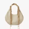 Borsa hobo Twisted Shell in pelle lucida Borsa hobo Twisted Shell in pelle lucida