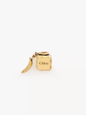 Bracciale con ciondolo a forma di cubo, banana e dadi in ottone Bracciale con ciondolo a forma di cubo, banana e dadi in ottone