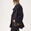 Cappotto doppiopetto oversize in lana Cappotto doppiopetto oversize in lana