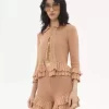 Cardigan aderente con volant in maglia all’uncinetto Cardigan aderente con volant in maglia all’uncinetto
