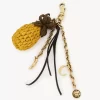Ciondolo per borsa a forma di ananas in rafia, metallo e pelle Ciondolo per borsa a forma di ananas in rafia, metallo e pelle