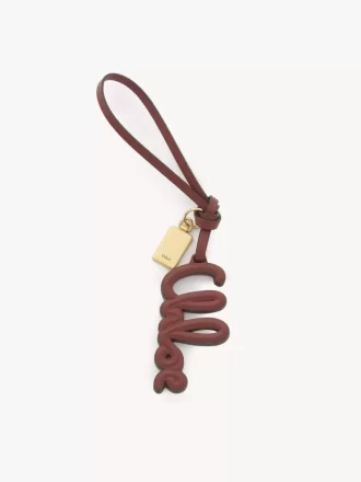 Ciondolo per borsa con logo in pelle lucida