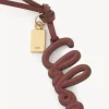 Ciondolo per borsa con logo in pelle lucida Ciondolo per borsa con logo in pelle lucida