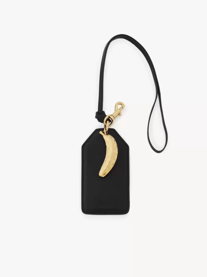 Etichetta a forma di banana in pelle lucida Etichetta a forma di banana in pelle lucida