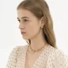 Gli orecchini Chloé Mechanical Flowers Gli orecchini Chloé Mechanical Flowers
