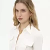 Gli orecchini Chloé Pompoms Gli orecchini Chloé Pompoms