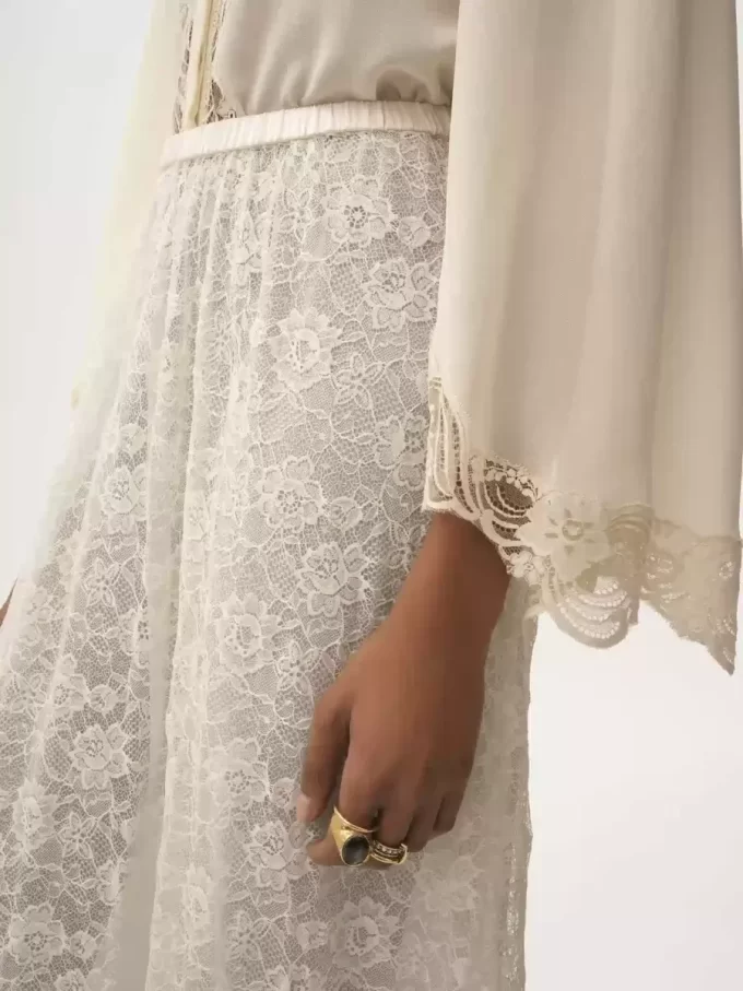 Gonna midi con volant in pizzo jacquard floreale Gonna midi con volant in pizzo jacquard floreale