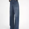 Jeans a gamba larga in denim Jeans a gamba larga in denim